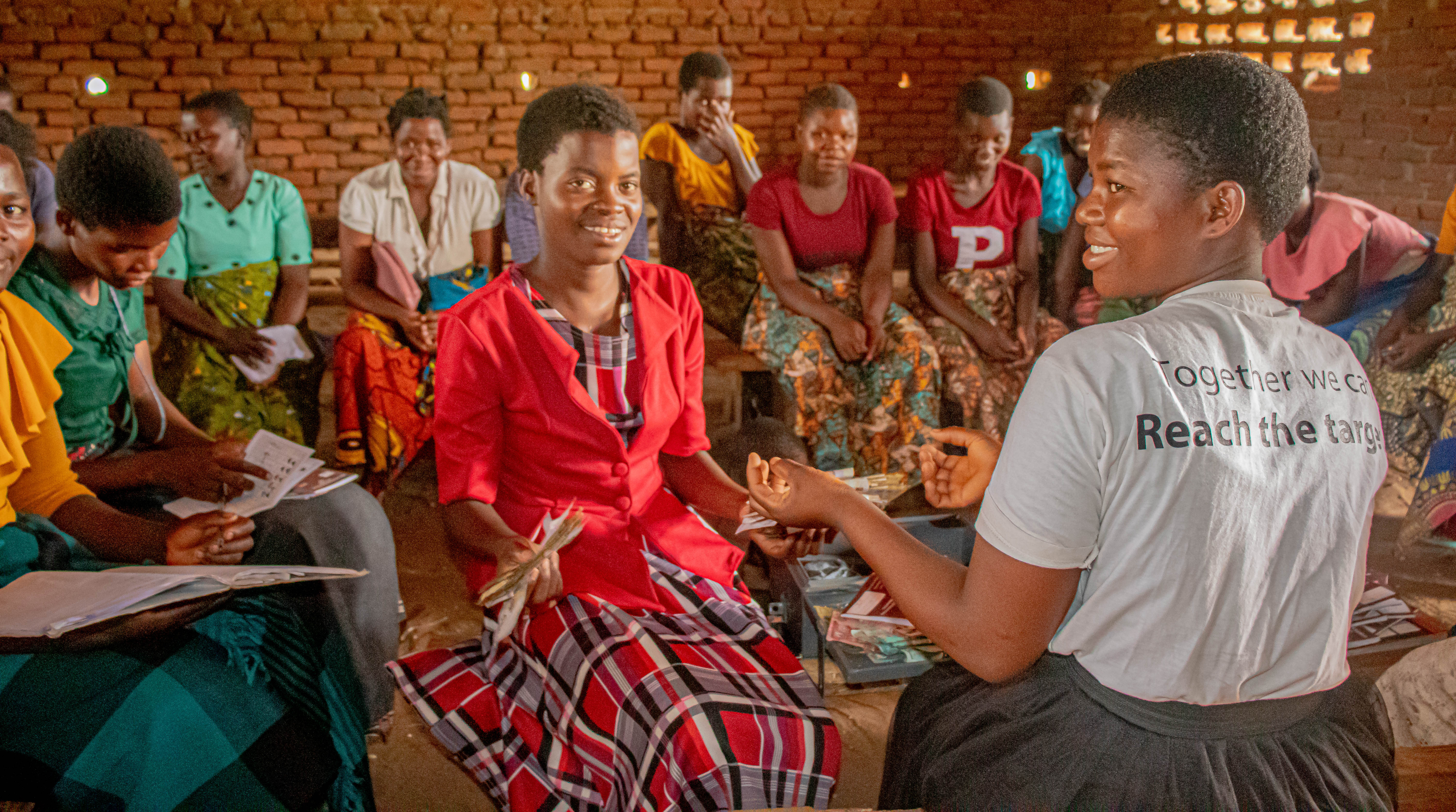 Girls running a Savings and Loans Group