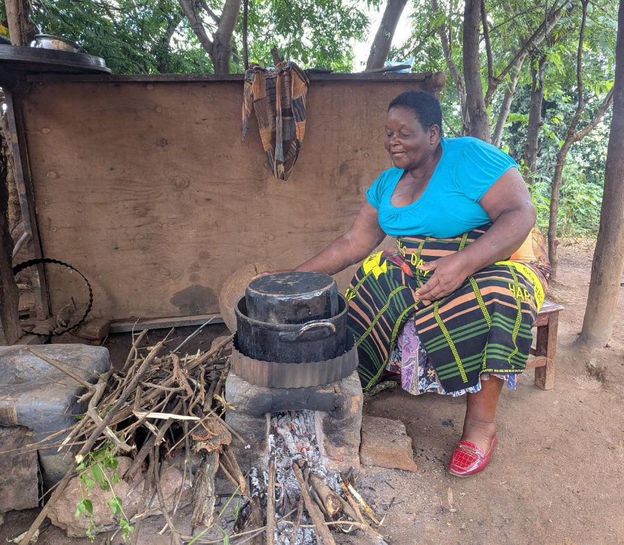 One of the activities in the project includes promotion of firewood savings stoves,  here in use by one of the farmers