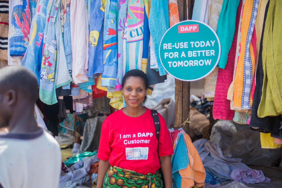 selling secoundhand clothes at a local market